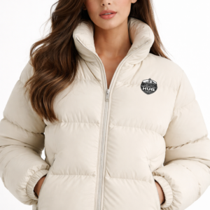 Women’s bone color puffer jacket with full zip front, insulated winter jacket on white background