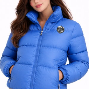 Women’s blue puffer jacket with full zip front, insulated winter jacket on white background