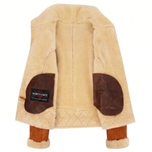 Women’s Merino sheepskin aviator jacket in Dynamo Tan with a cream shearling collar, full front zip, zip pockets, quilted cuffs and shearling-trimmed hem.