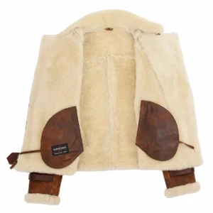 Women's rustic brown sheepskin aviator shearling pilot jacket with cross zip and buckled waist belt