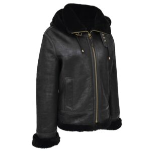 Women's black B3 sheepskin bomber jacket featuring a plush black shearling collar with double throat latch straps, front brass zip closure, and shearling-lined hem and cuffs.