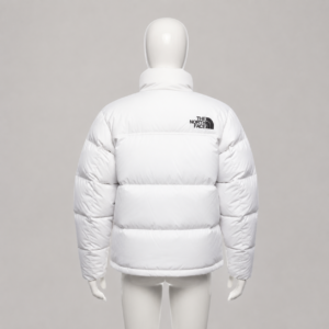 The North Face Men’s 1996 Retro Nuptse white puffer jacket with a high collar, black full-zip closure, quilted insulation, side pockets and black chest logo.